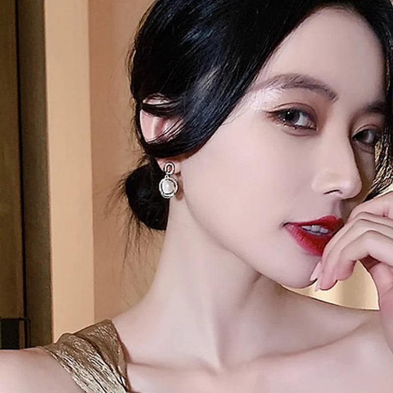 Korea New White Moonlight Cat's Eye Stone Earrings For Women Small Fresh Geometric Eardrop Elegant Ladies Temperament Jewelry