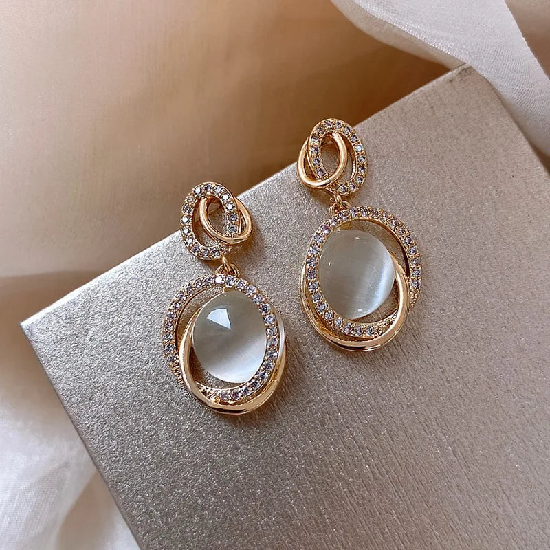 Korea New White Moonlight Cat's Eye Stone Earrings For Women Small Fresh Geometric Eardrop Elegant Ladies Temperament Jewelry